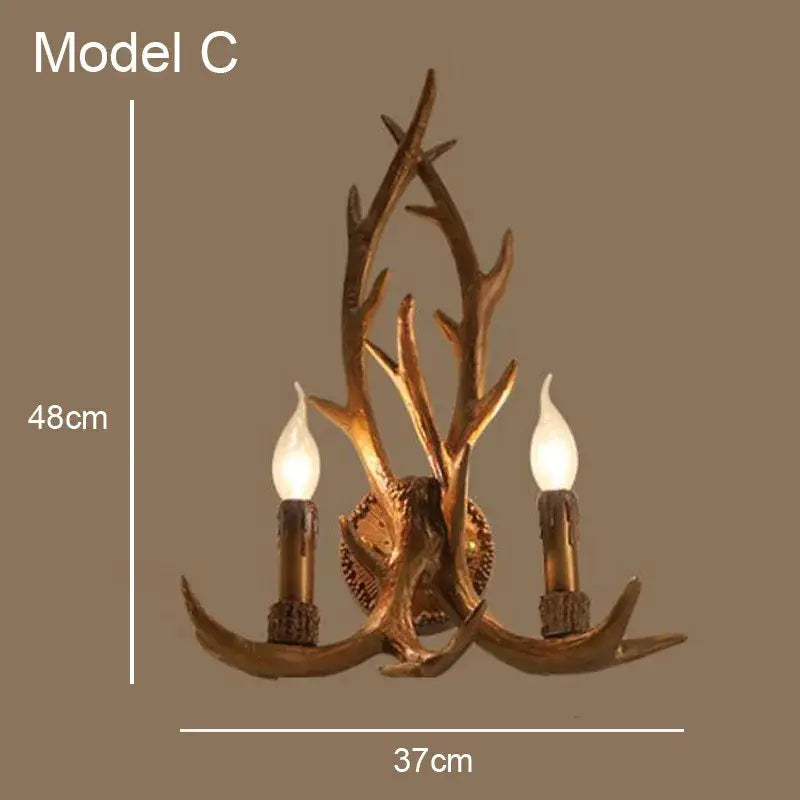 Rustic wood finish decorbites deer antler wall sconce with two candle bulbs in golden brown metallic finish for dining room lighting