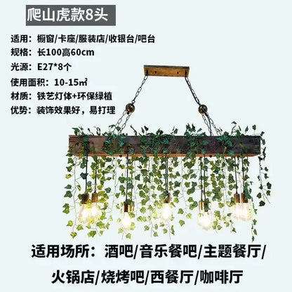 Rustic wood hanging chandeliers with eight exposed edison bulbs and green ivy for dining room or bar hanging use