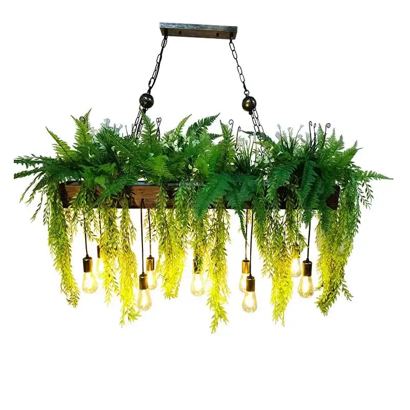 Rustic wood hanging chandeliers with lush green ferns and vintage edison bulbs for dining room or bar hanging use