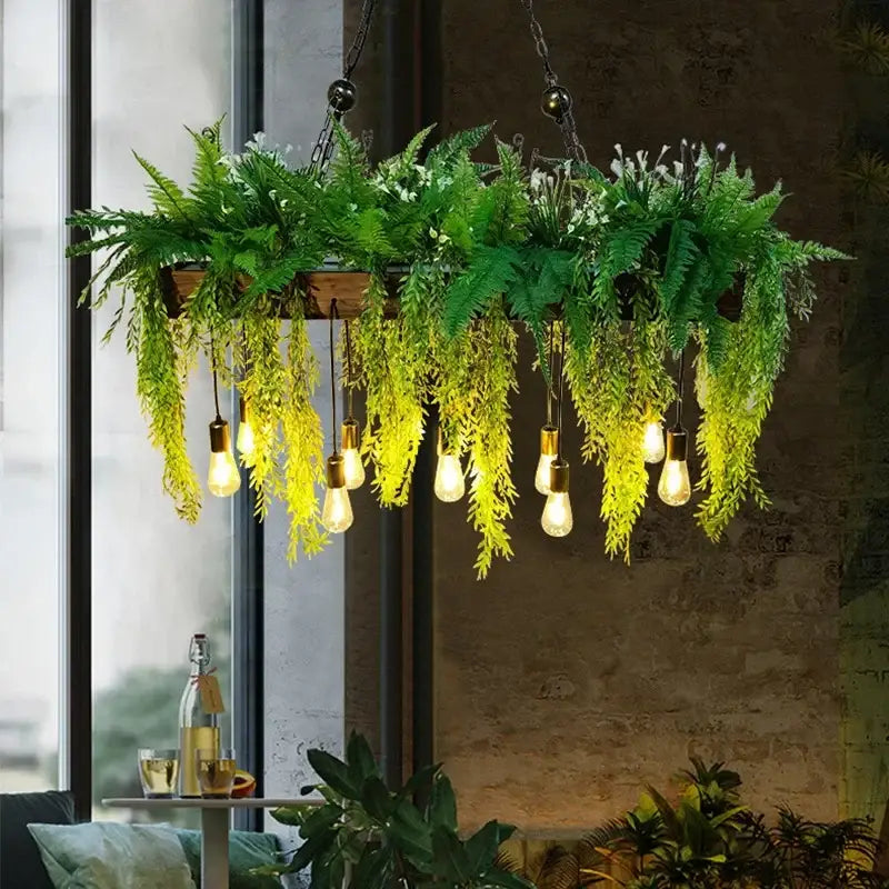 Rustic wood hanging chandeliers planter with edison bulbs featuring green ferns and white flowers for bar hanging chandeliers
