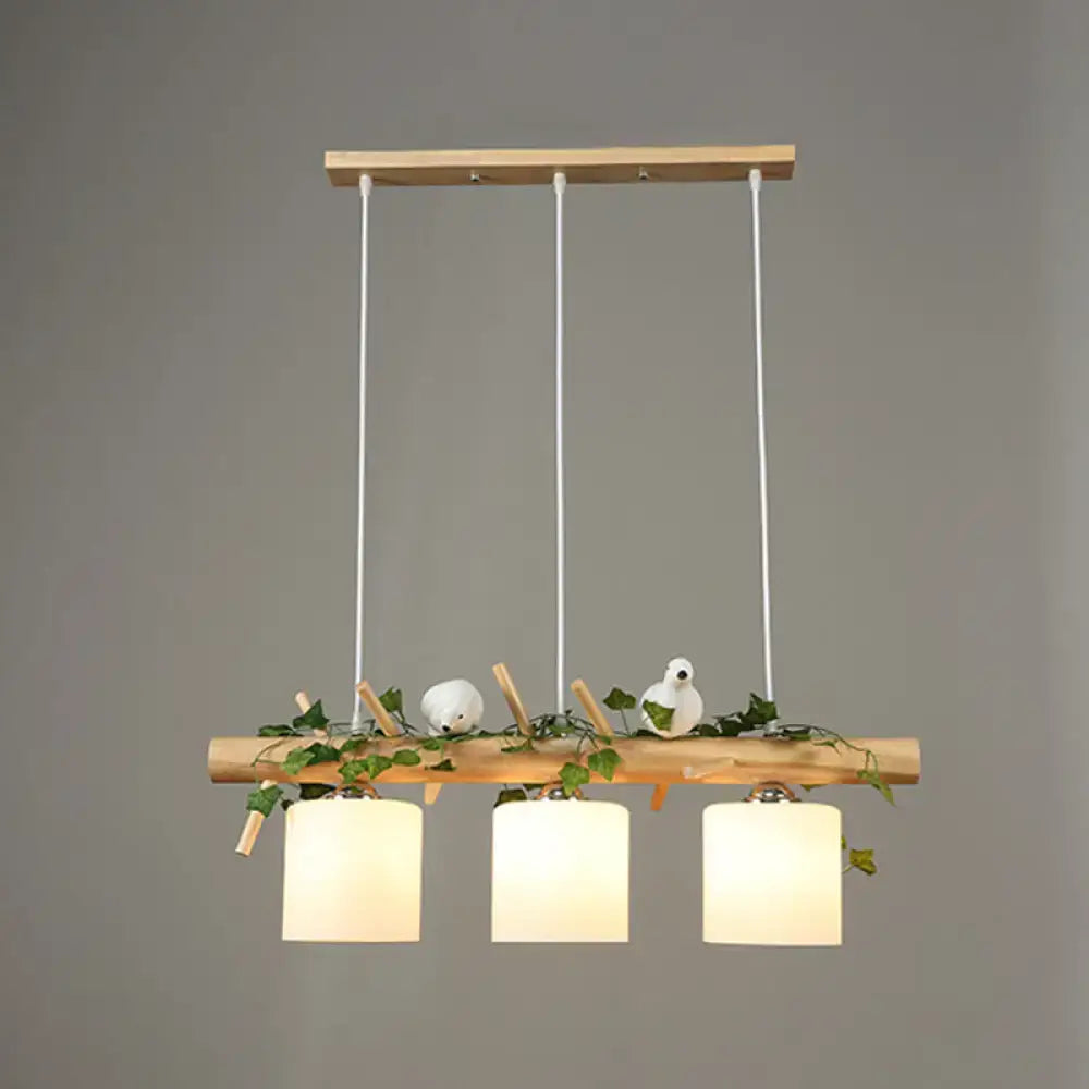 DecorBites™ natural wood pendant light with frosted glass shades white ceramic birds and decorative maple leaf plant vines