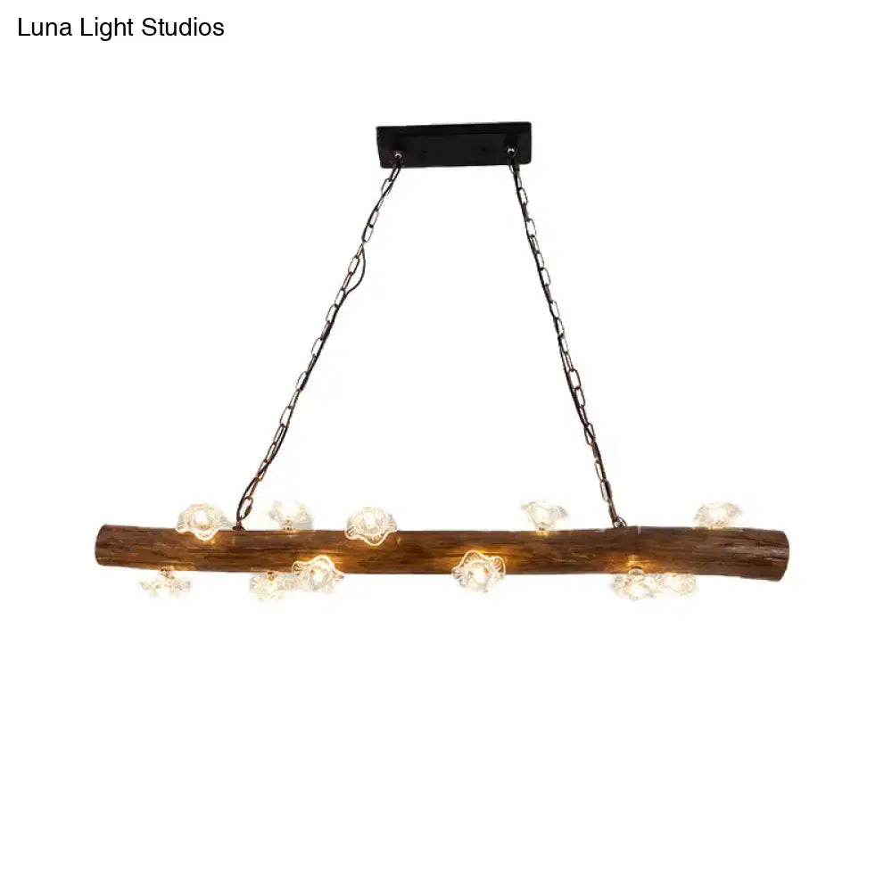 Rustic wood log hanging lamp with clear glass flower-shaped globe lights and black metal chains for kitchen chandelier