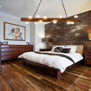 Rustic wood log hanging lamp with frosted glass globe lights designed as a kitchen chandelier centerpiece