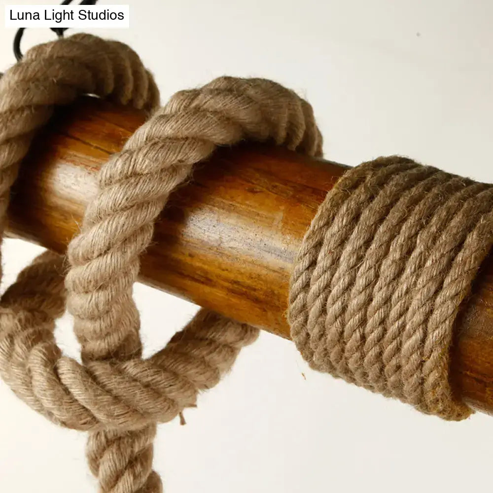 Natural fiber rope wrapped around a wooden pole in a rustic wooden beam and beige rope 3 light island pendant kitchen light