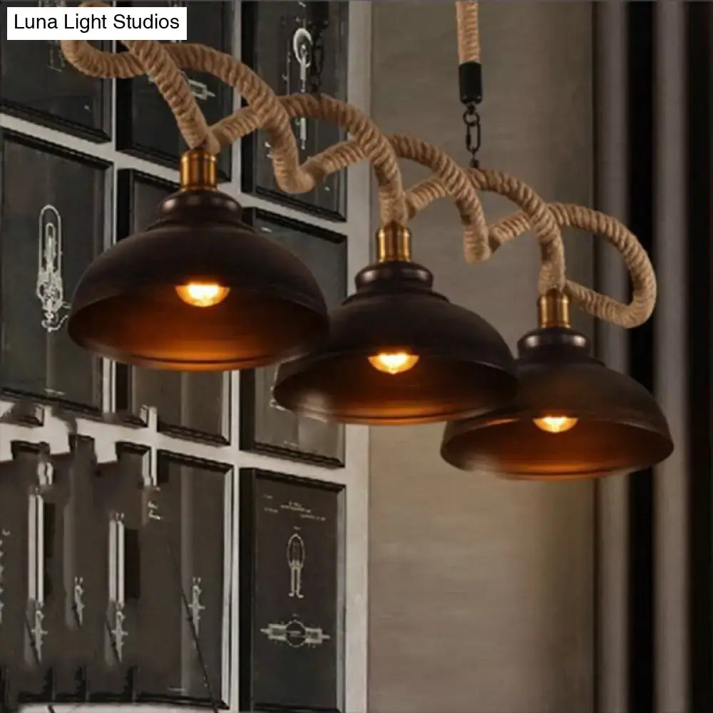 Rustic wooden beam three light island pendant with dark bronze dome shades and natural beige rope suspension