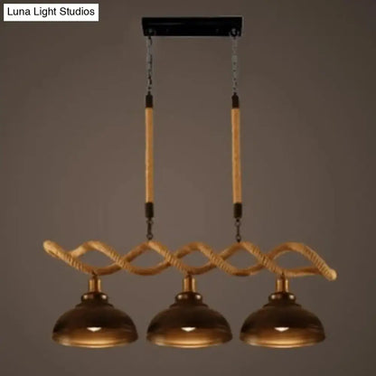 Rustic wooden beam three-light island pendant kitchen light with brass dome shades and beige twisted rope detailing