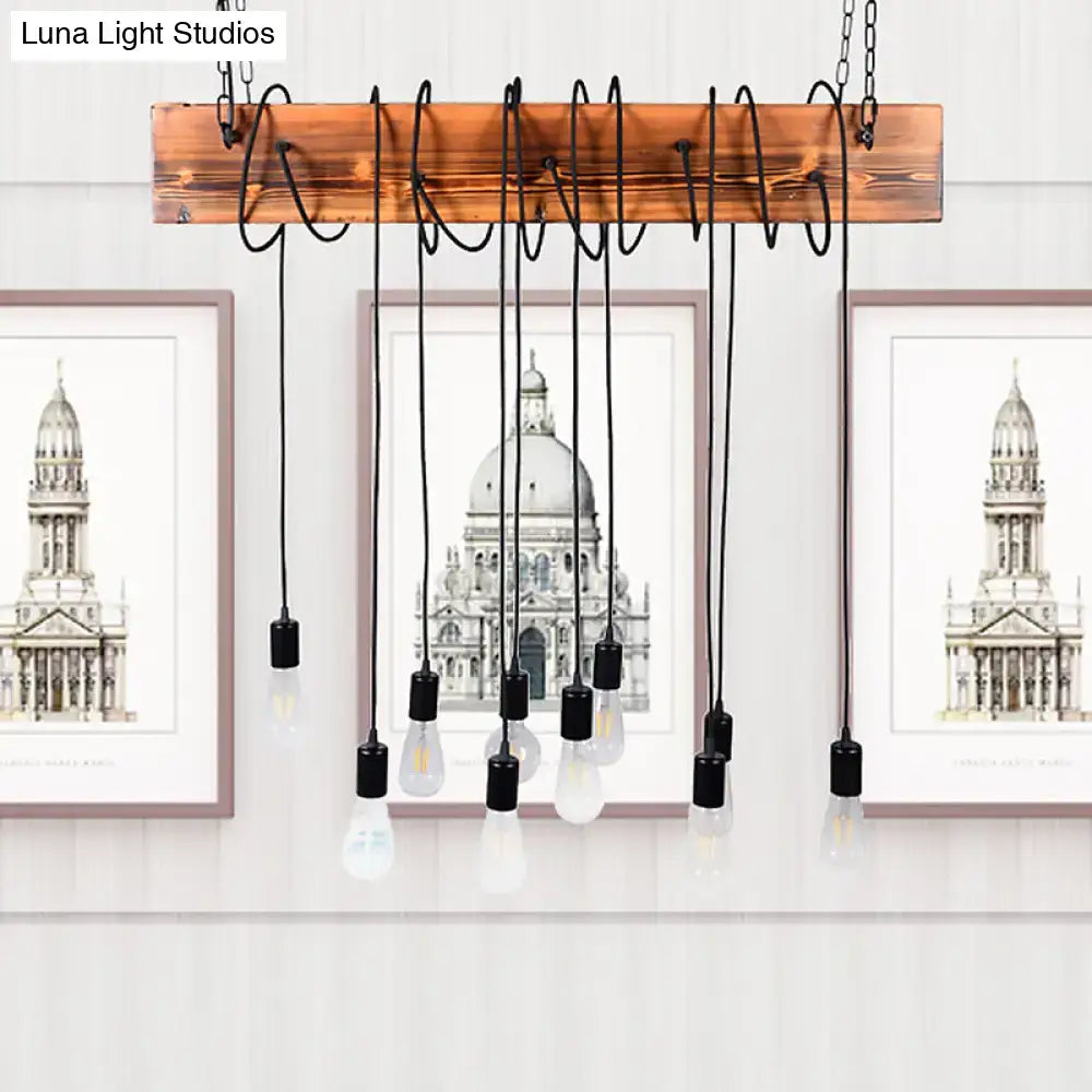 Rustic wooden beam pendant light with black antique brass metal chains and clear edison bulbs in multi light chandelier design