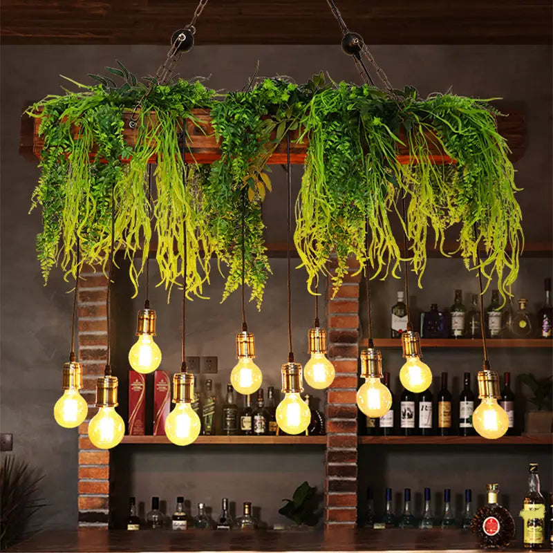 Industrial-style hanging light fixture with e26 e27 bare bulbs and faux green fern deco in wooden planter, fixture width set