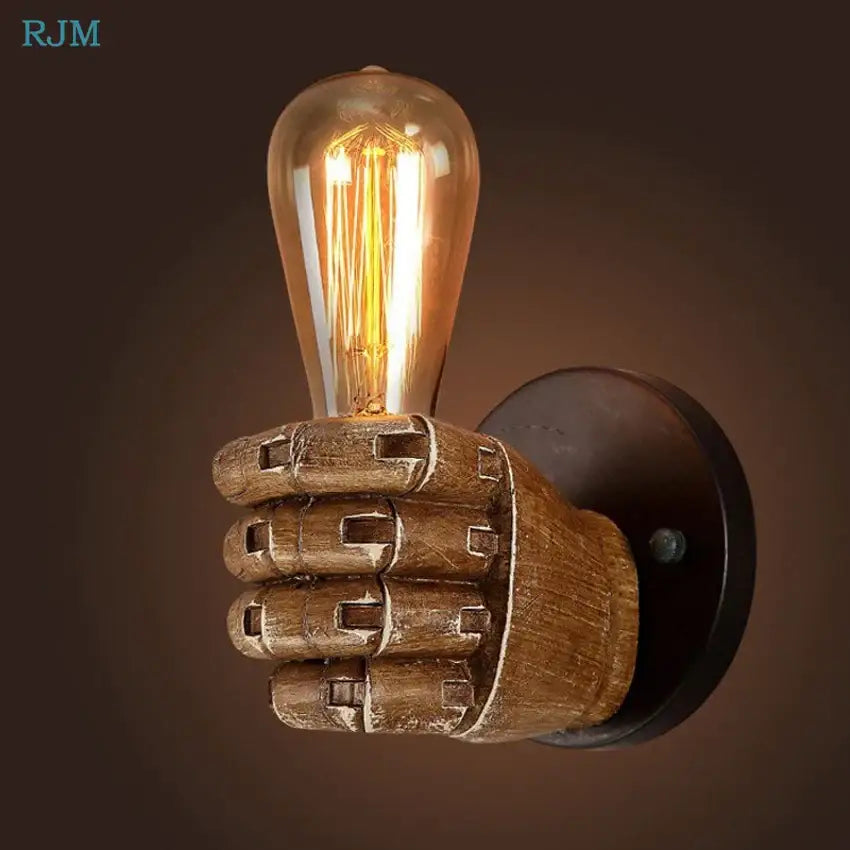 Rustic wooden hand model wall lamp featuring a glowing amber filament bulb for vintage living room wall lamps