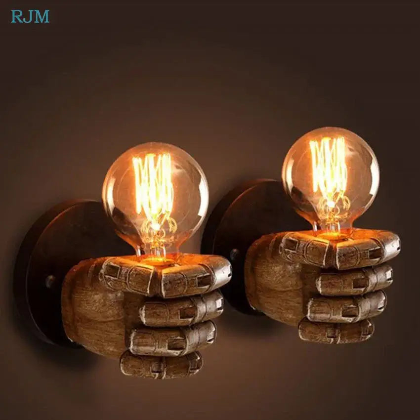 Rustic wooden hand model wall lamp featuring vintage wall lamps with intricately carved hands holding glowing bulbs