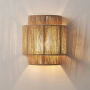 Warm-toned tiered wall lights crafted from woven natural hemp rope with a textured rustic finish by decorbites