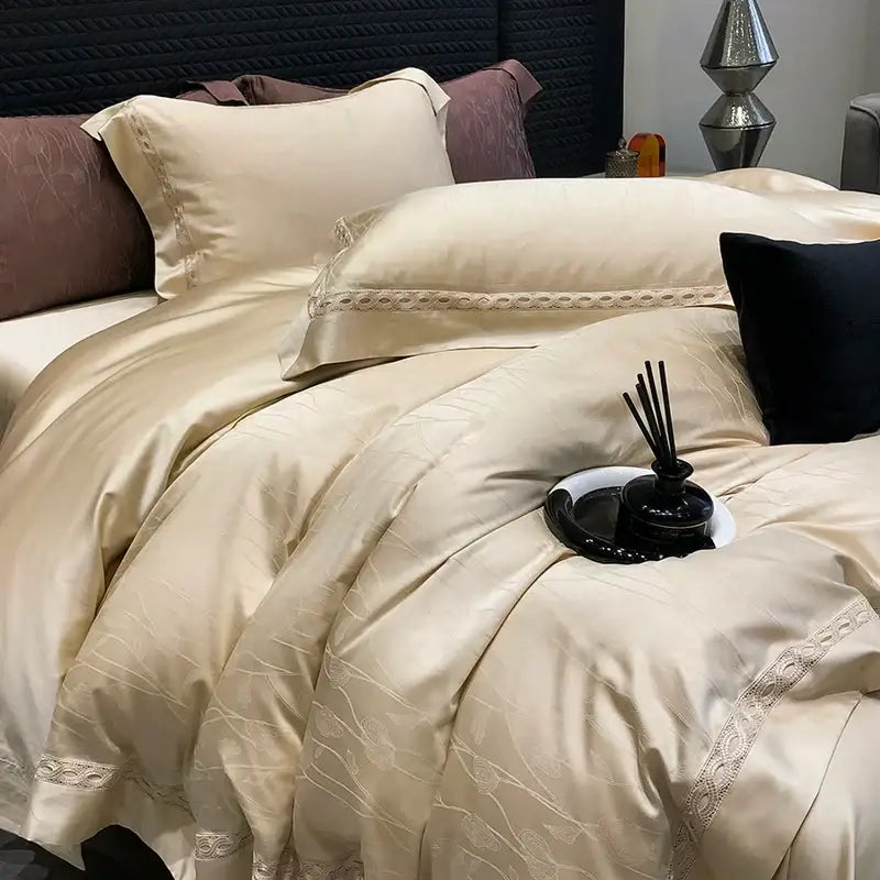 Cream-colored satin bedding set with delicate lace trim and subtle woven patterns in decorbites 1000tc lyocell cotton