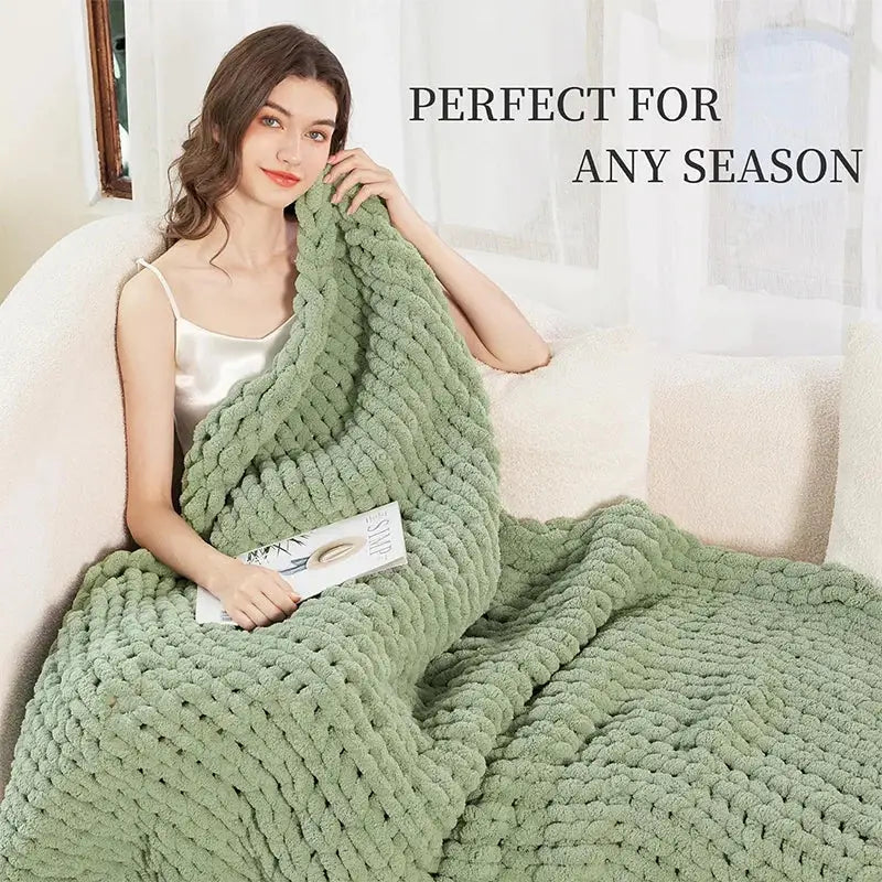 A sage green chunky knit cozy autumn fleece blanket with a soft textured pattern perfect for decorbites cozy autumn use