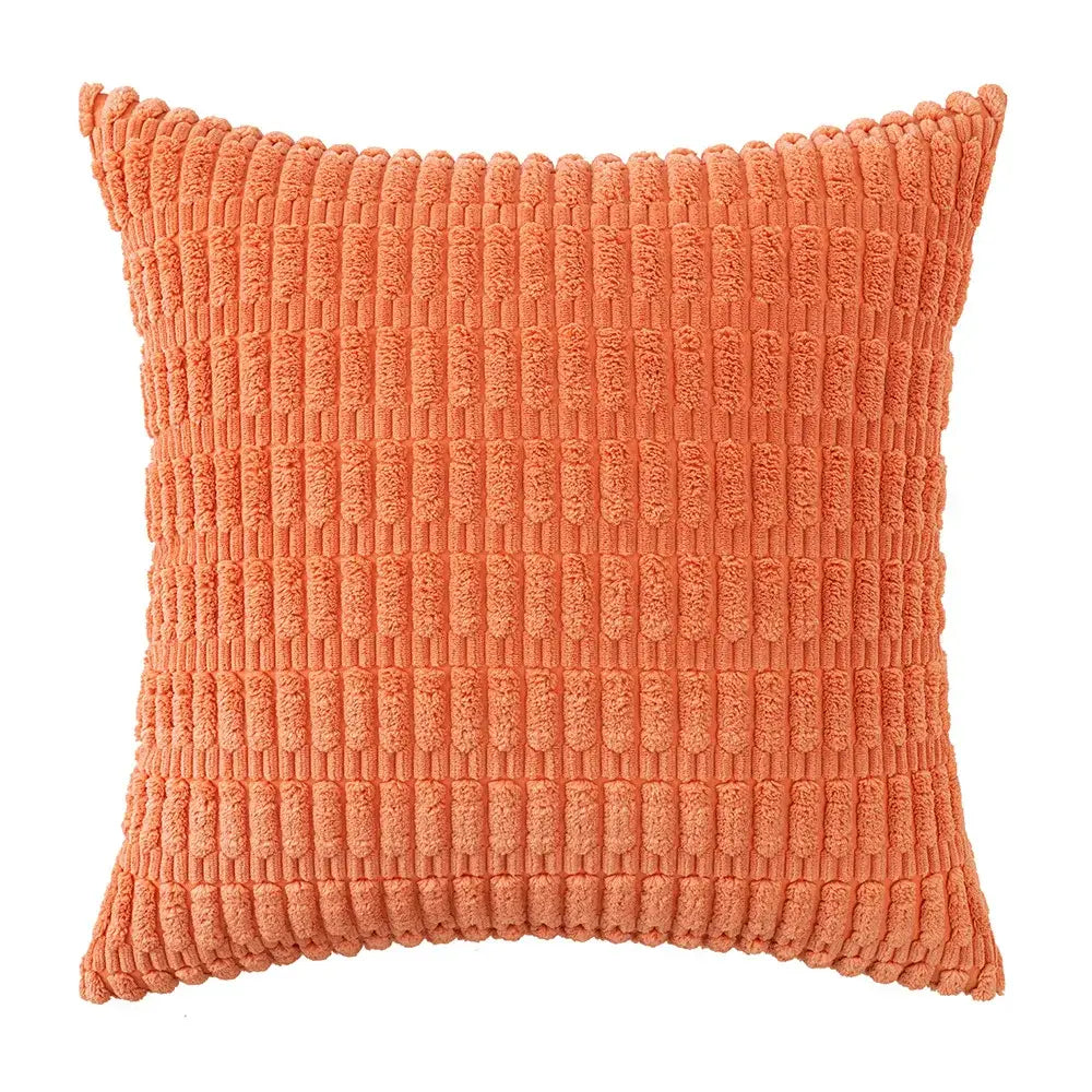 Coral-colored corduroy throw pillow with a textured ribbed pattern paired with sage green corduroy velvet pillowcase set