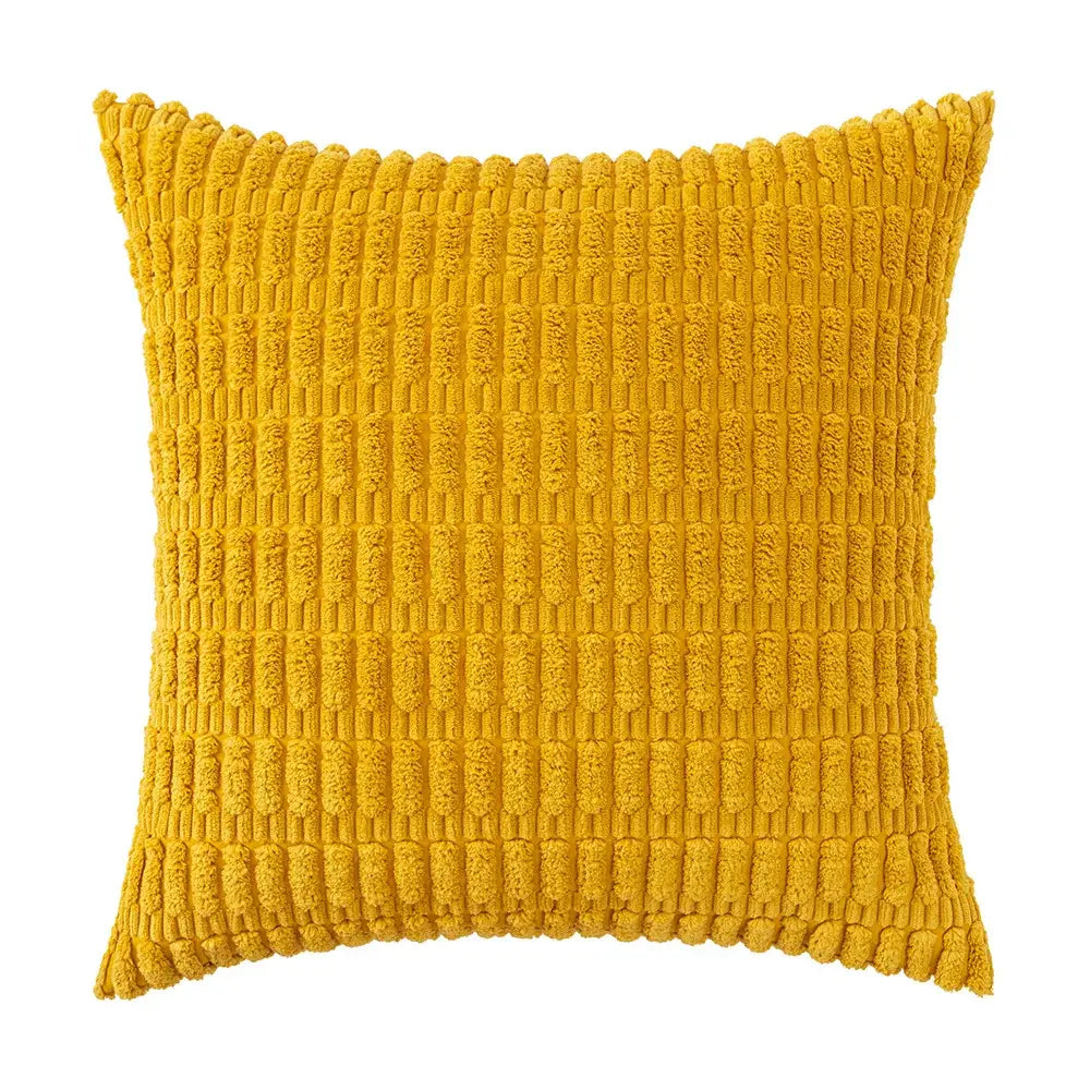 A vibrant mustard-yellow throw pillow with textured ribbed corduroy fabric from a sage green corduroy velvet pillowcase set