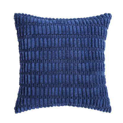 Deep blue corduroy velvet throw pillow with ribbed texture in a sage green corduroy pillowcase set of 2 cushions