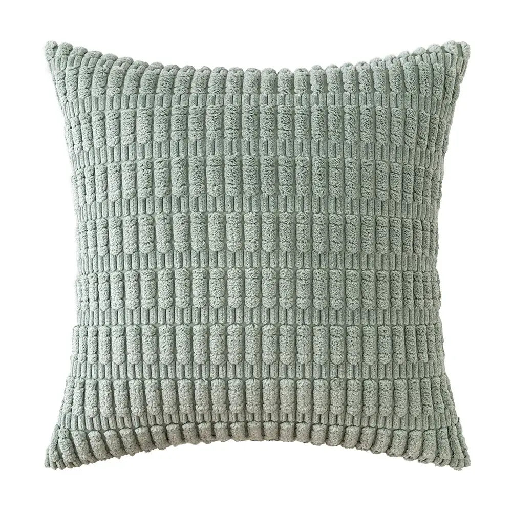 A soft sage green corduroy velvet throw pillow with a textured ribbed pattern from a pillowcase set of 2