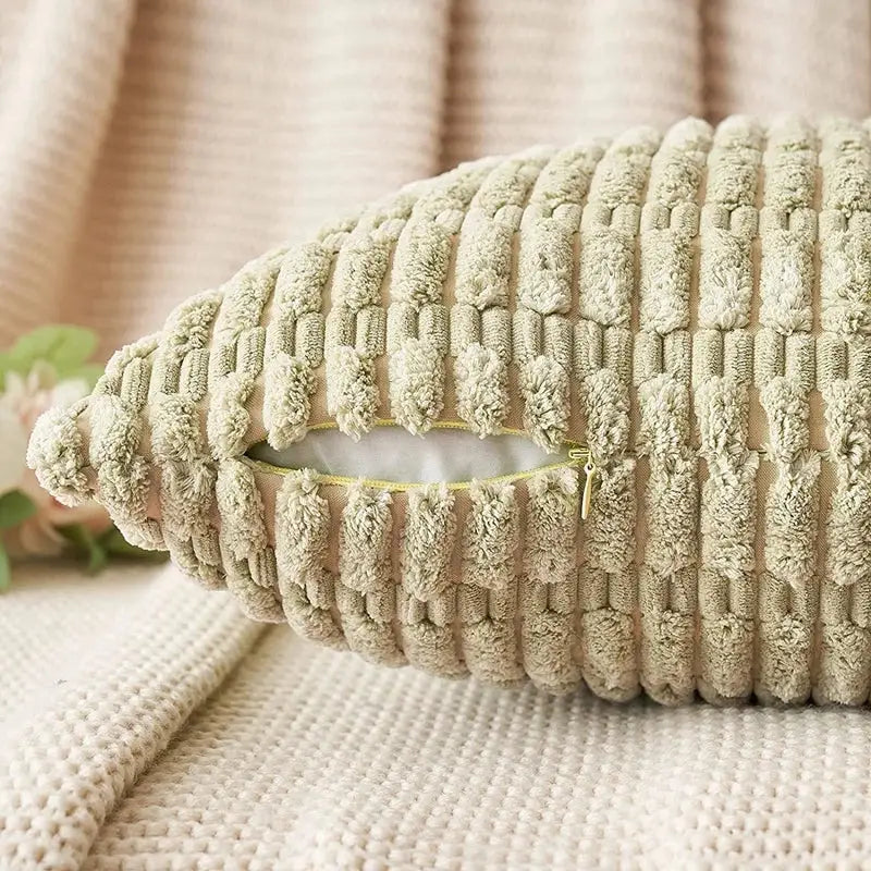Beige corduroy velvet pillow with textured ribbed surface and zipper closure from sage green corduroy pillowcase set