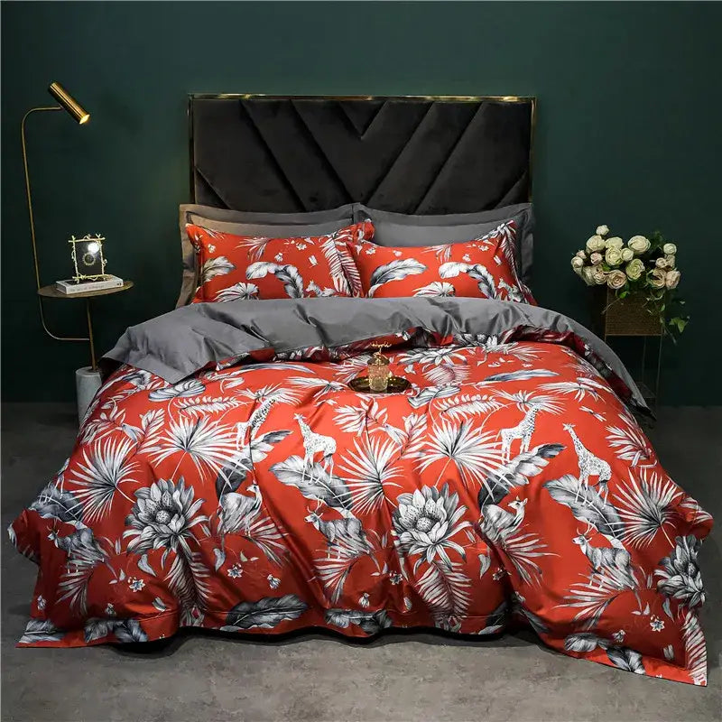 Vibrant red tropical-themed duvet set with giraffes and palm leaves in decorbites 1400tc egyptian cotton bedding set