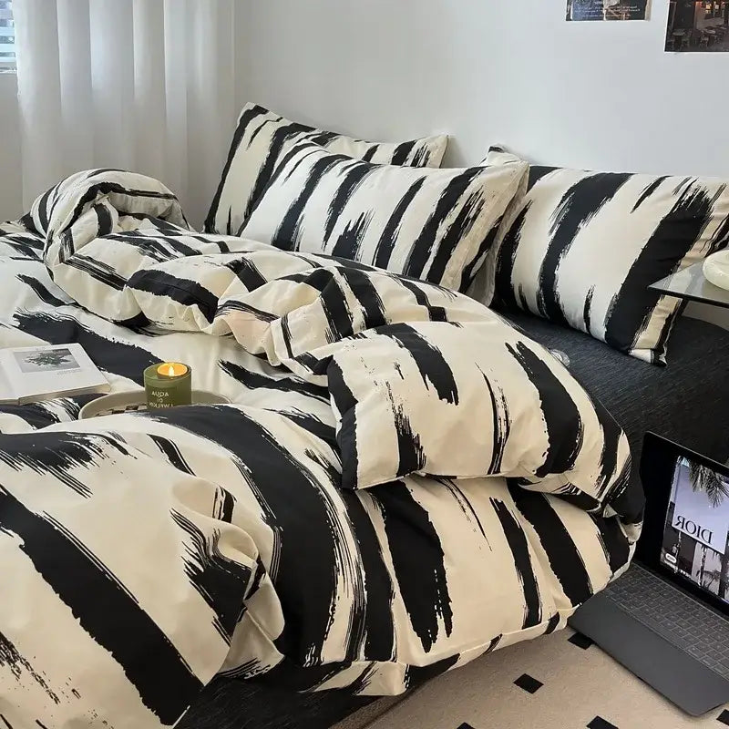 Black and cream bedding set with bold brushstroke stripes complementing decorbites grid print cotton bedroom decor