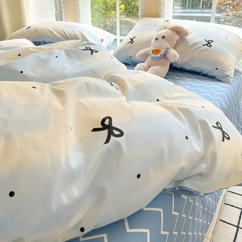 Light blue and white bedding set with black bow and dot patterns in decorbites grid print cotton for bedroom