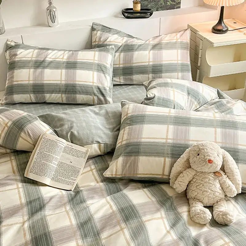 Sage green grid print cotton bedding set in soft green beige and cream tones with cozy textured fabric by decorbites grid print