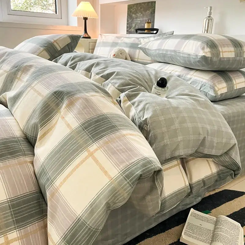 Sage green grid print cotton bedding set with cream and beige tones featuring cozy cotton texture by decorbites