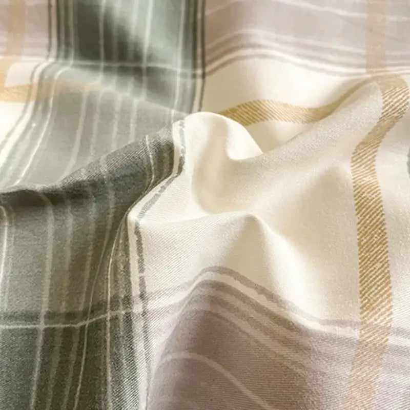 Sage green grid print cotton bedding set featuring soft textured fabric with a subtle plaid decorbites grid print