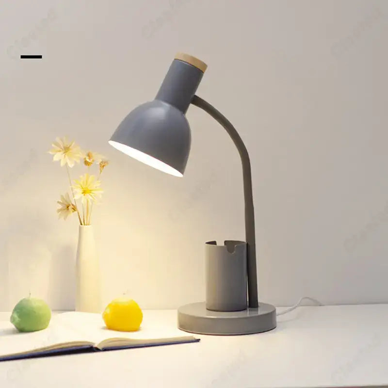 Sage green nordic desk lamp with gray metal curved neck wooden top integrated ashtray and pen holder decorbites cute nordic