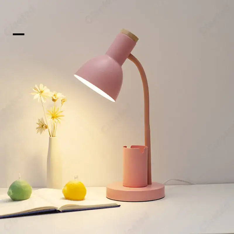 Pastel pink desk lamp with curved neck and wooden accent paired with sage green nordic desk lamp with pen holder from decorbites cute nordic collection