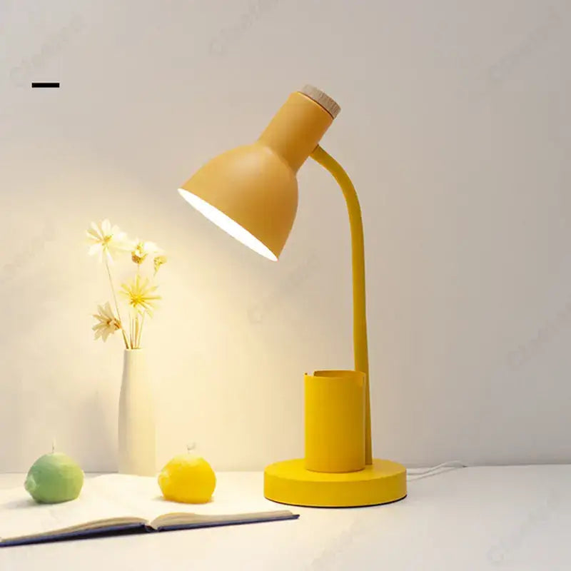 Yellow desk lamp with curved neck and integrated cylindrical pen holder by decorbites cute nordic for bedroom use