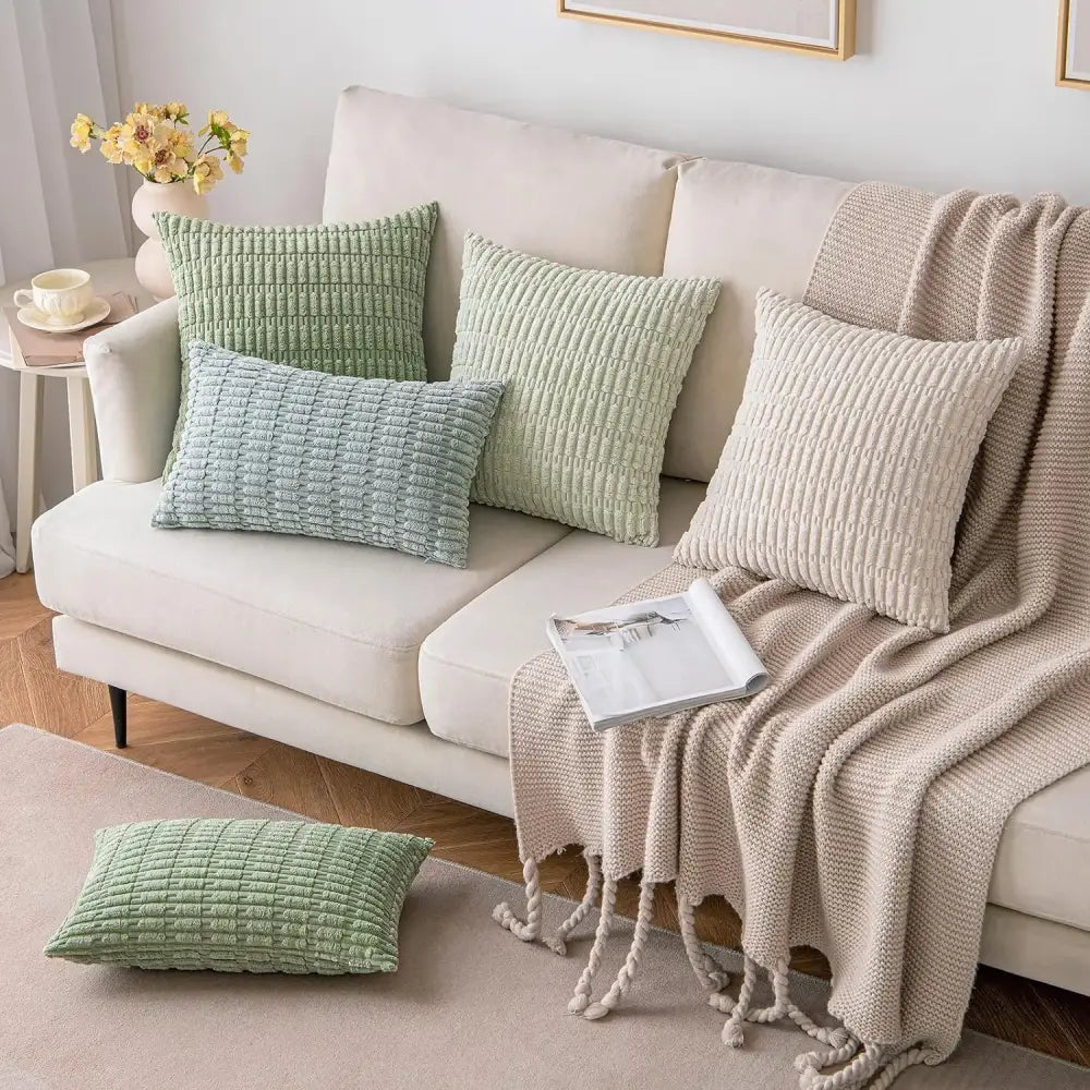 Set of three sage green and beige ribbed knit throw pillow covers in corduroy fabric for living room decor