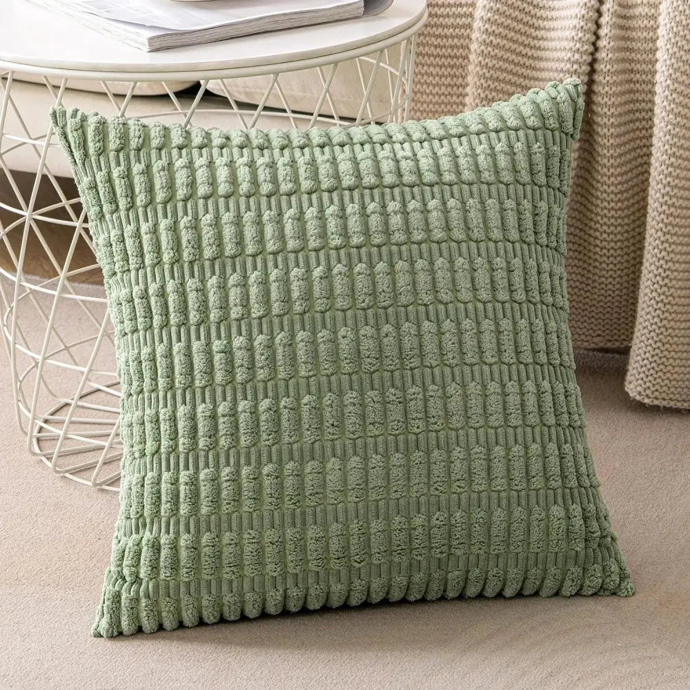 Soft sage green ribbed corduroy throw pillow cover with raised woven pattern for living room decor