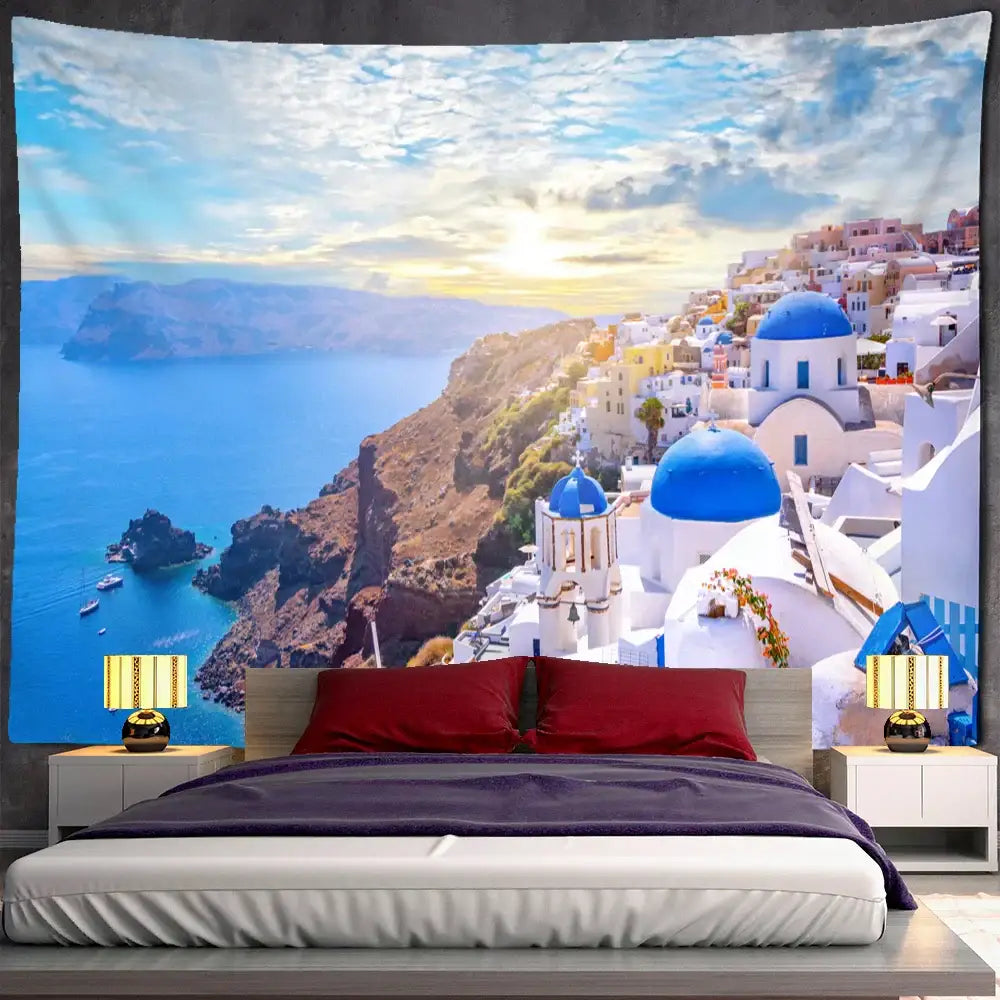 A vibrant santorini castle village sunset tapestry featuring white buildings and blue domes for bedroom wall art