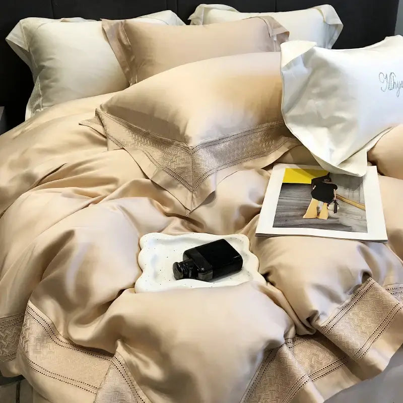 Beige satin bedding set with subtle gold embroidery edges in a decorbites 1000tc lyocell fibre bedding set