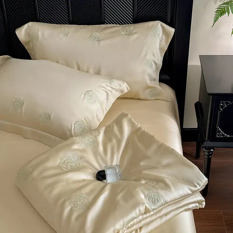 Cream satin quilt set with delicate eucalyptus fiber flower embroidery for elegant bedroom decorbites eucalyptus fiber