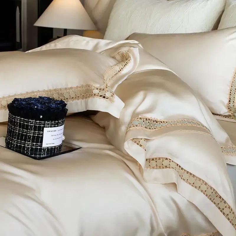 Cream-colored satin duvet cover set with delicate gold lace trim for elegant bedroom bedding cover set