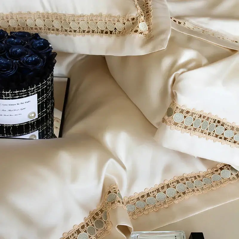 Cream satin duvet cover set with delicate gold and silver lace trim for elegant bedroom bedding cover set