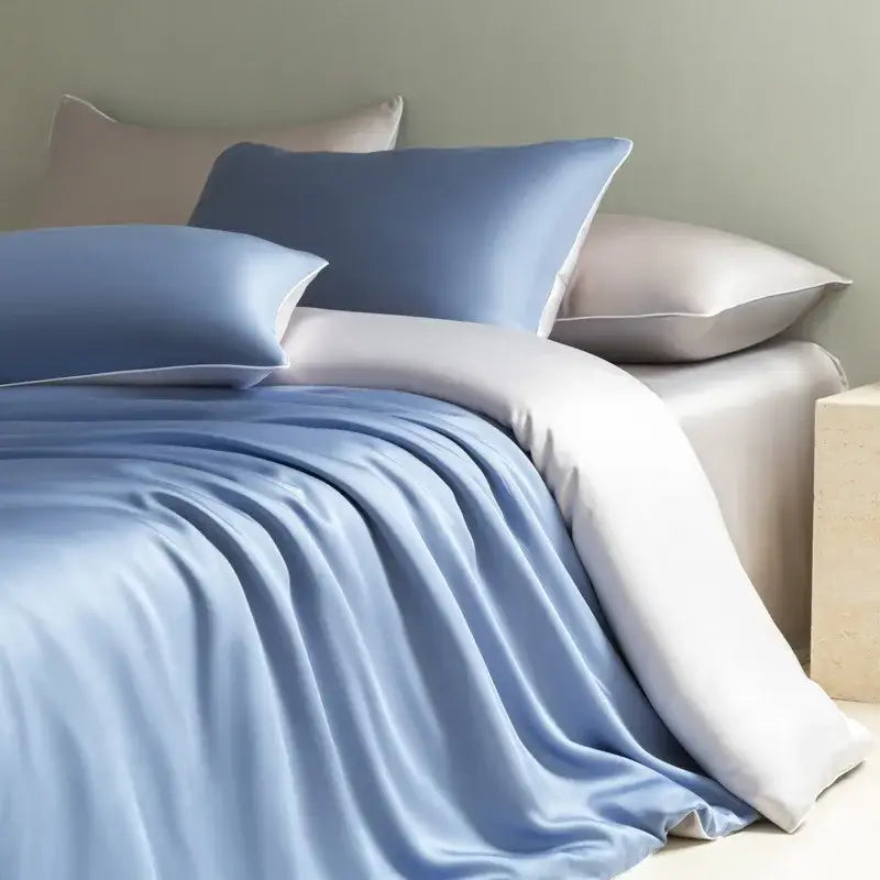 Blue satin duvet cover bedding set with matching pillowcases solid color featuring decorbites cool touch and subtle sheen