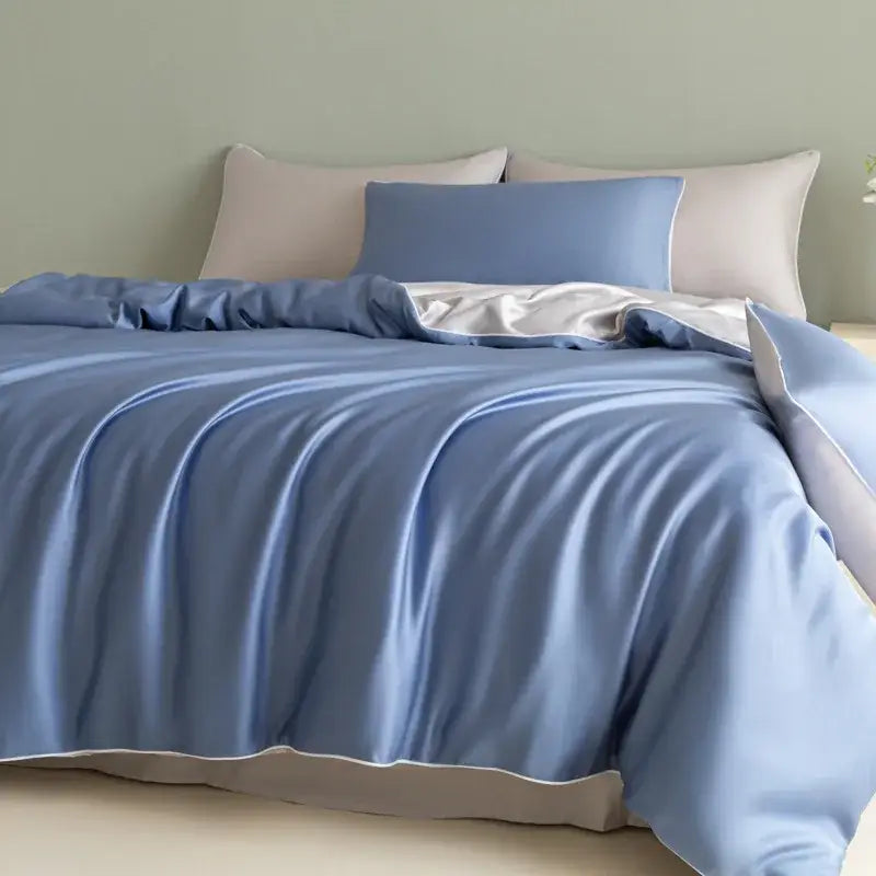 Soft light blue satin duvet cover with white lining featuring decorbites cool touch in solid color bedding set