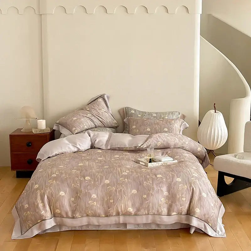Beige floral satin duvet set with subtle gold embroidery and matching pillowcases in egyptian cotton bedding set