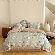 Light blue satin duvet cover with subtle circular pattern and pink piping in egyptian cotton bedding set