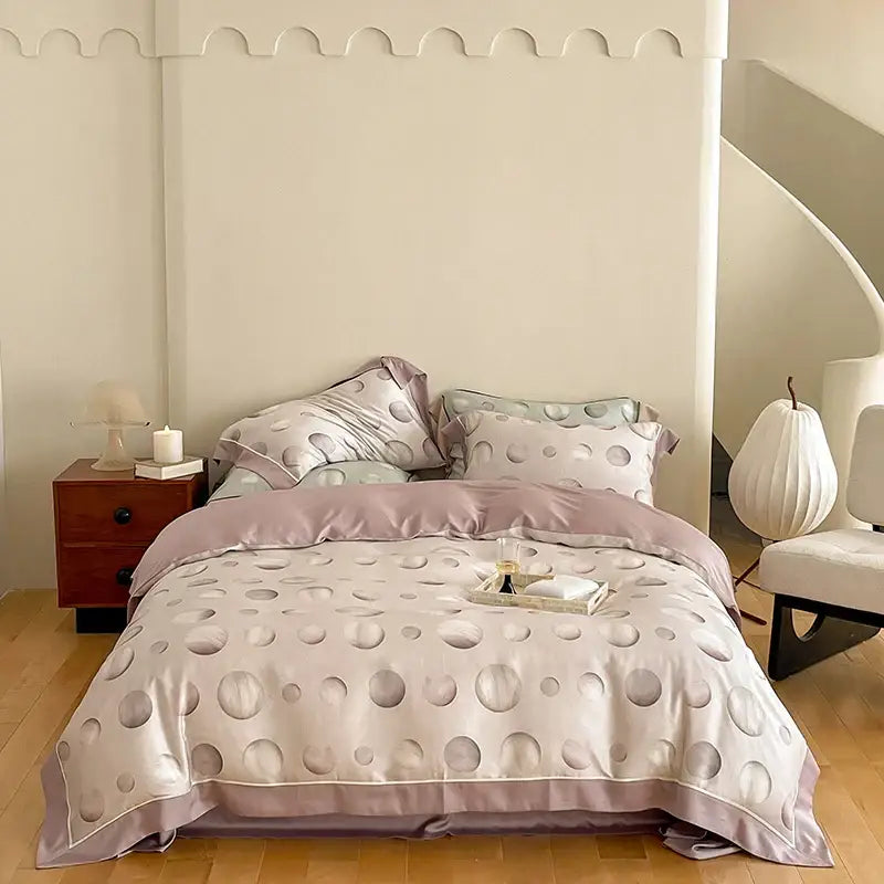 A soft lavender and cream satin duvet set with raised circular dots in an egyptian cotton bedding set