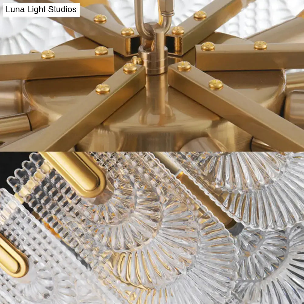 Gold-toned brass DecorBites scalloped clear textured glass drop lamp with fan-shaped shades for classic dining rooms
