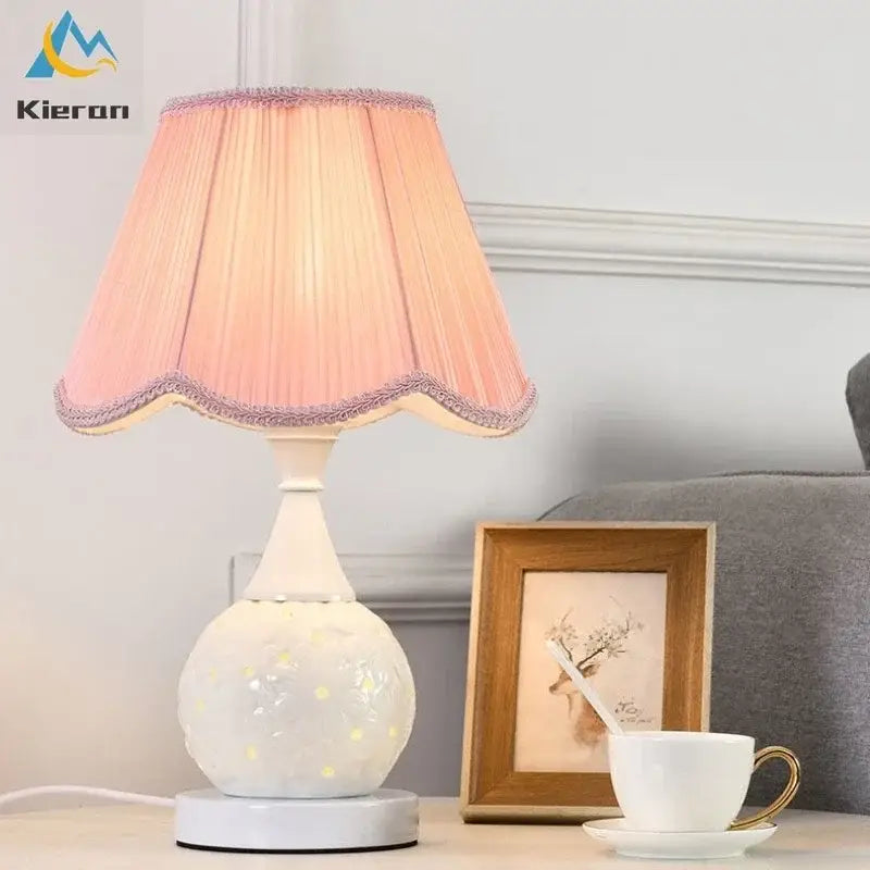 Pink pleated lampshade with lavender trim on white scalloped cream ceramic led desk lamp with gold polka dots decorbites ceramic led