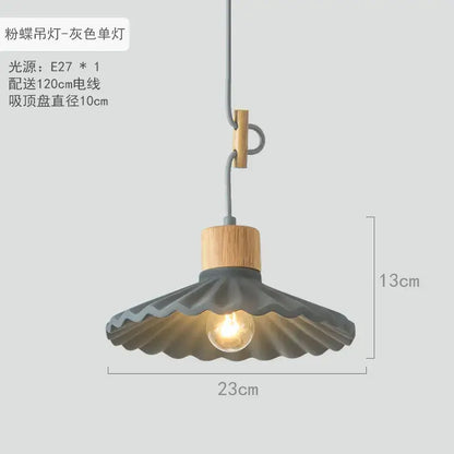 Gray scalloped led pendant light with wooden collar and black metal wiring for dining room pendant lights