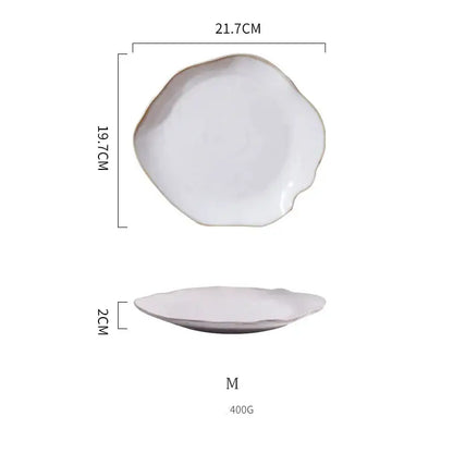Scalloped white ceramic dinner plate with handcrafted irregular rim and subtle glossy finish from decorbites dinner plate set