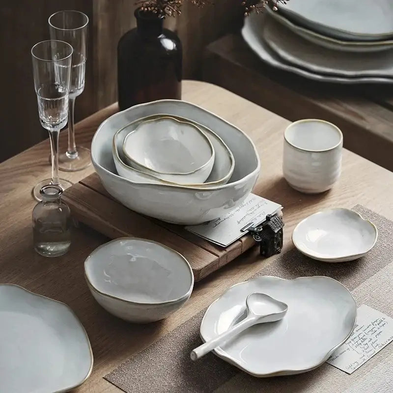 Set of white scalloped ceramic dinner plate set with handcrafted irregular edges and subtle gold rims for decorbites ceramic dinner