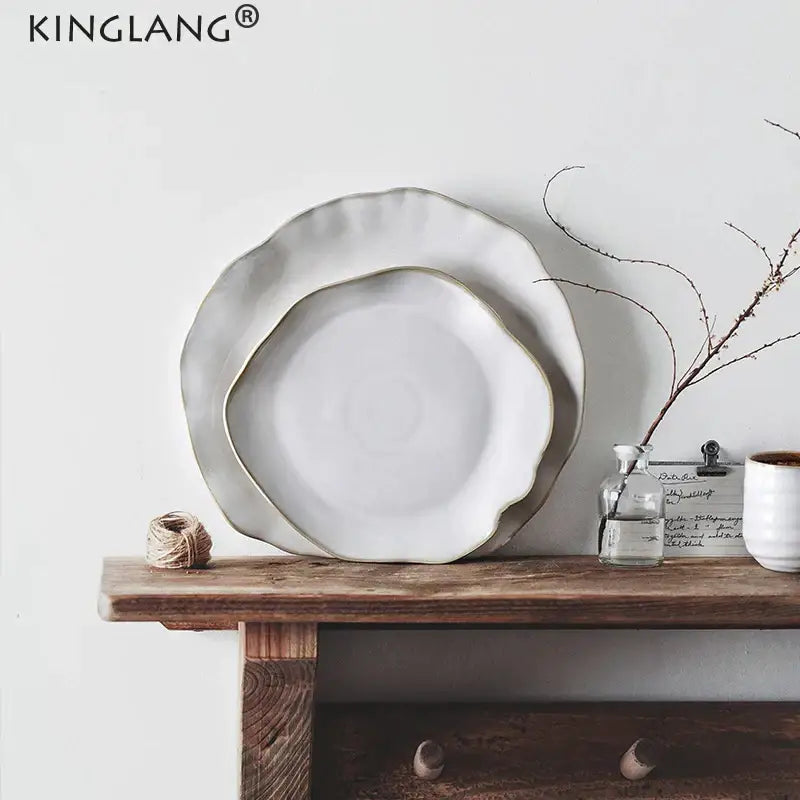 Scalloped white ceramic dinner plate set with subtle gold rim and wavy edges for decorbites ceramic dinner use
