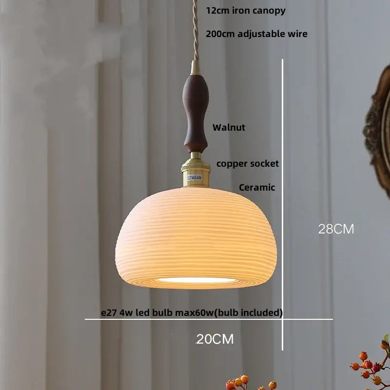 Scalloped white ceramic led pendant lamp with warm-toned ribbed texture, walnut handle, and brass copper socket decorbites ceramic led